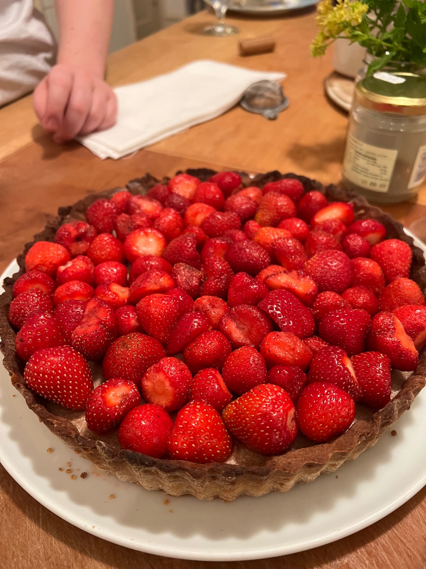 Fresh English strawberry tart on a chocolate sablé pastry case with crème pâtissière — a seasonal fruit dessert plated for a Lovey Chef private dinner in Bristol