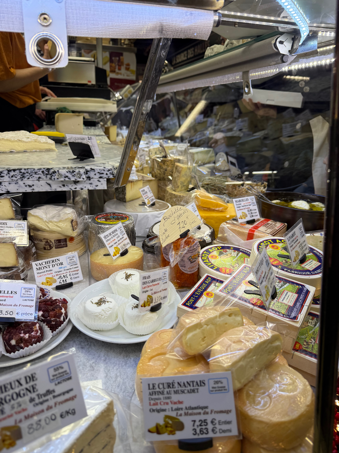 South of France fromagerie counter with artisan French cheeses, chèvre, Tomme and market dairy produce — provenance inspiration for Lovey Chef private dining in Bristol