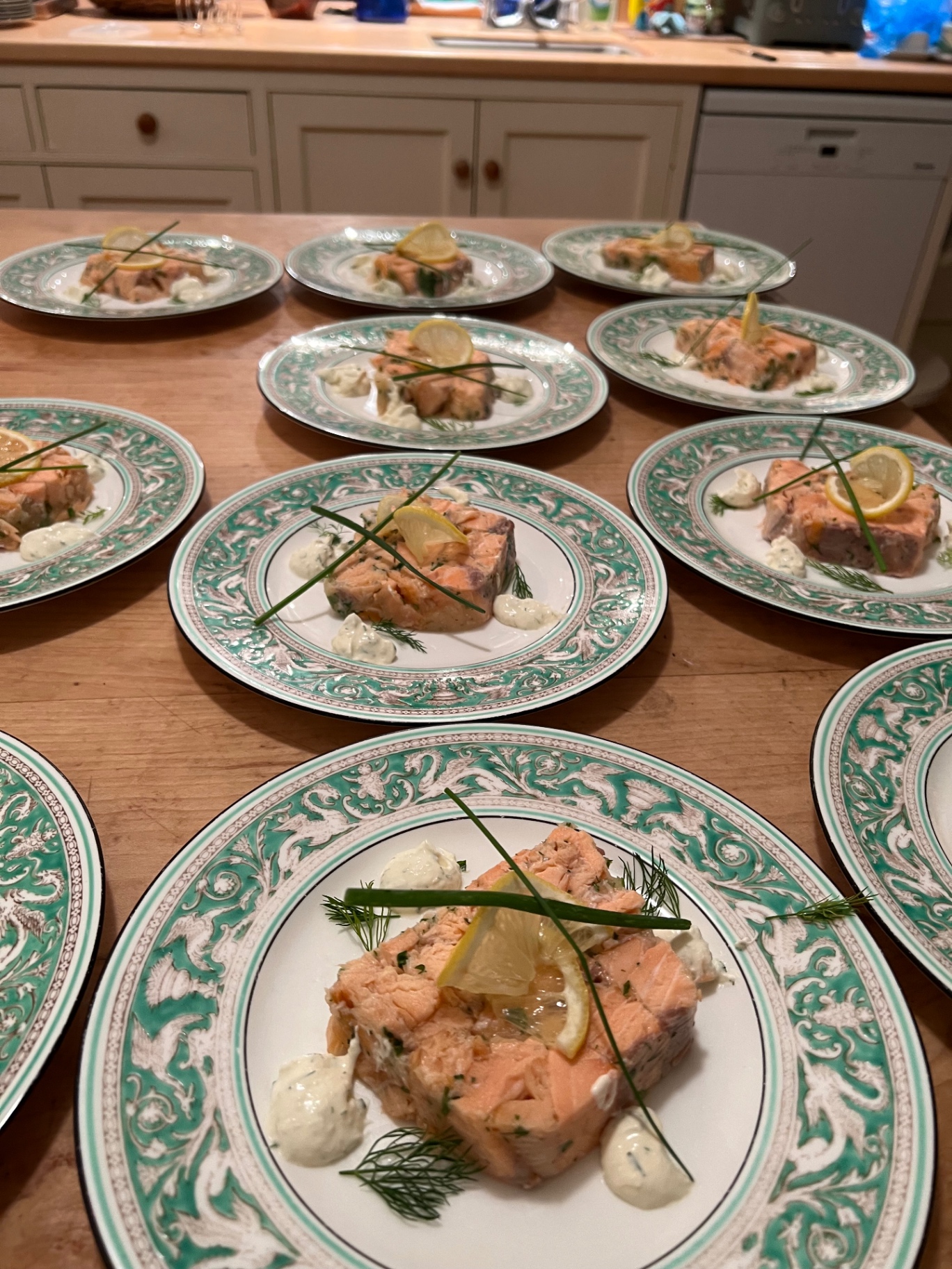 Slow-poached salmon terrine with dill, chives, lemon and crème fraîche tartare — fine dining starter plated across Wedgwood Florentine plates for a Lovey Chef private dinner